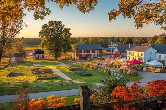 Scenic Hampshire IL farmstead with red farmhouse and autumn flowers representing Pure Auto Care car detailing service area